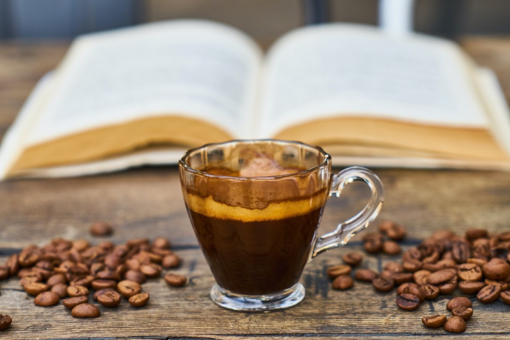 use of a garden room reading with coffee and a book