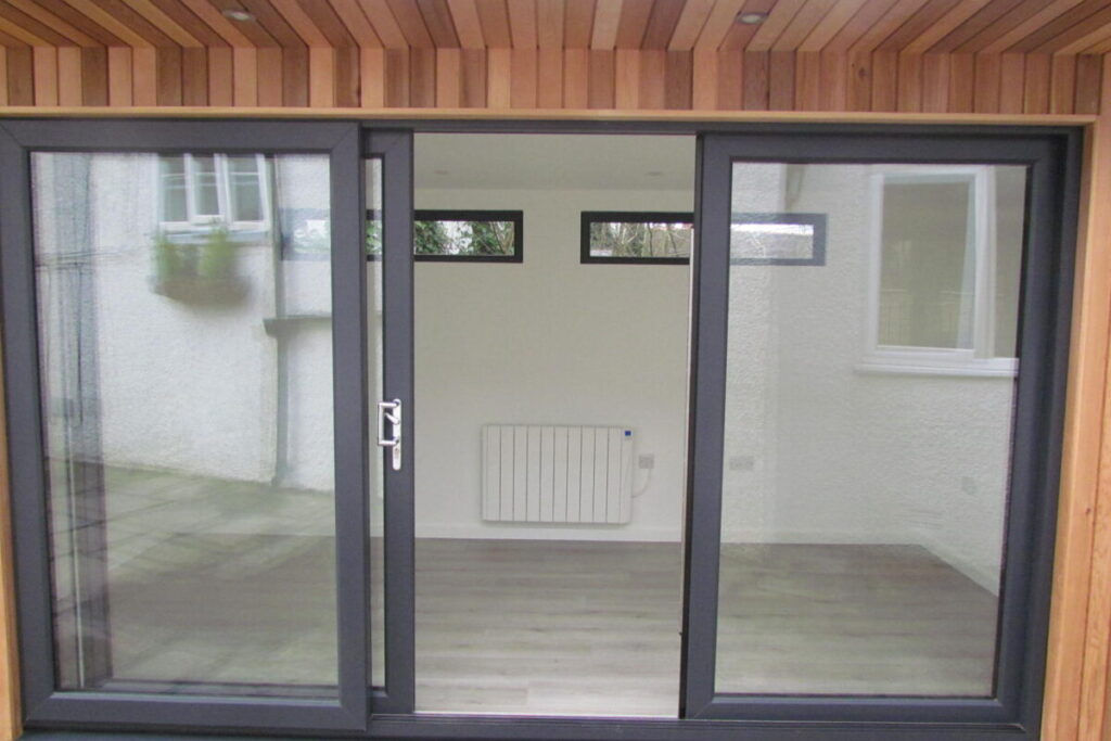 garden room heating electric radiator sliding doors