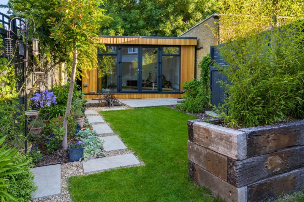 insulated wood garden room at back of garden