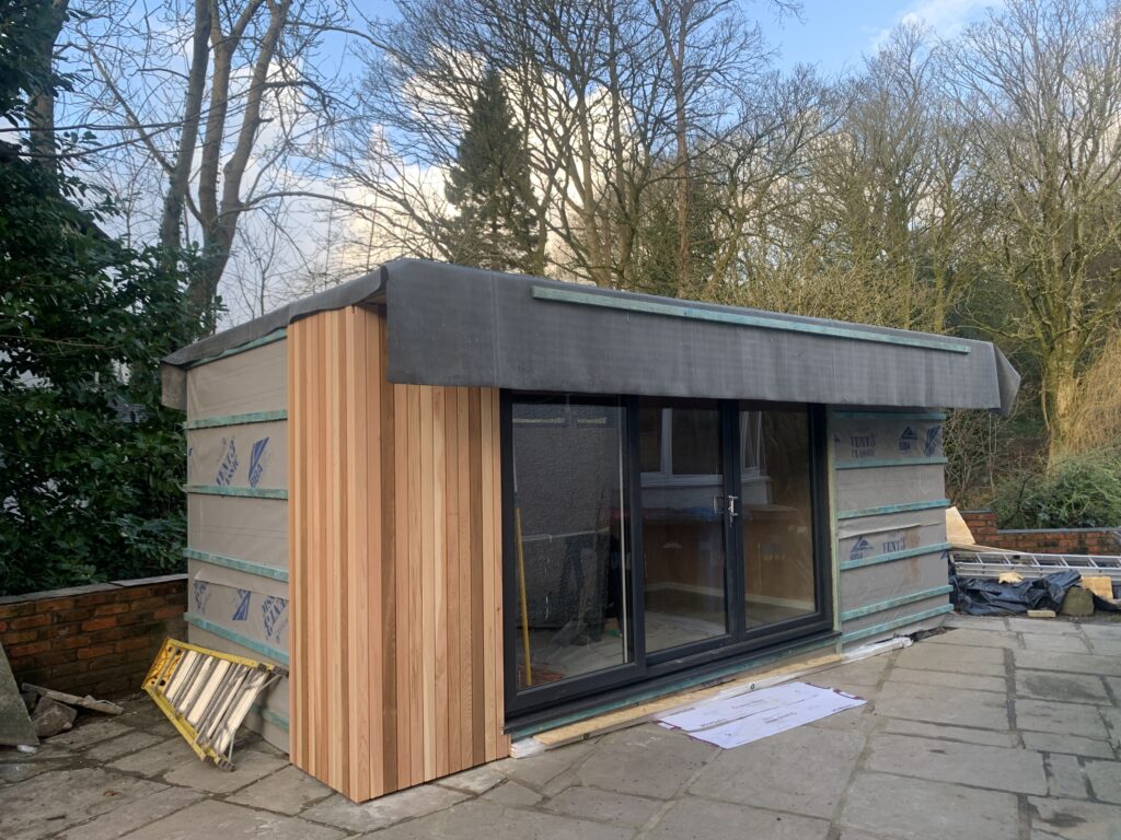 medium garden room build started cladding