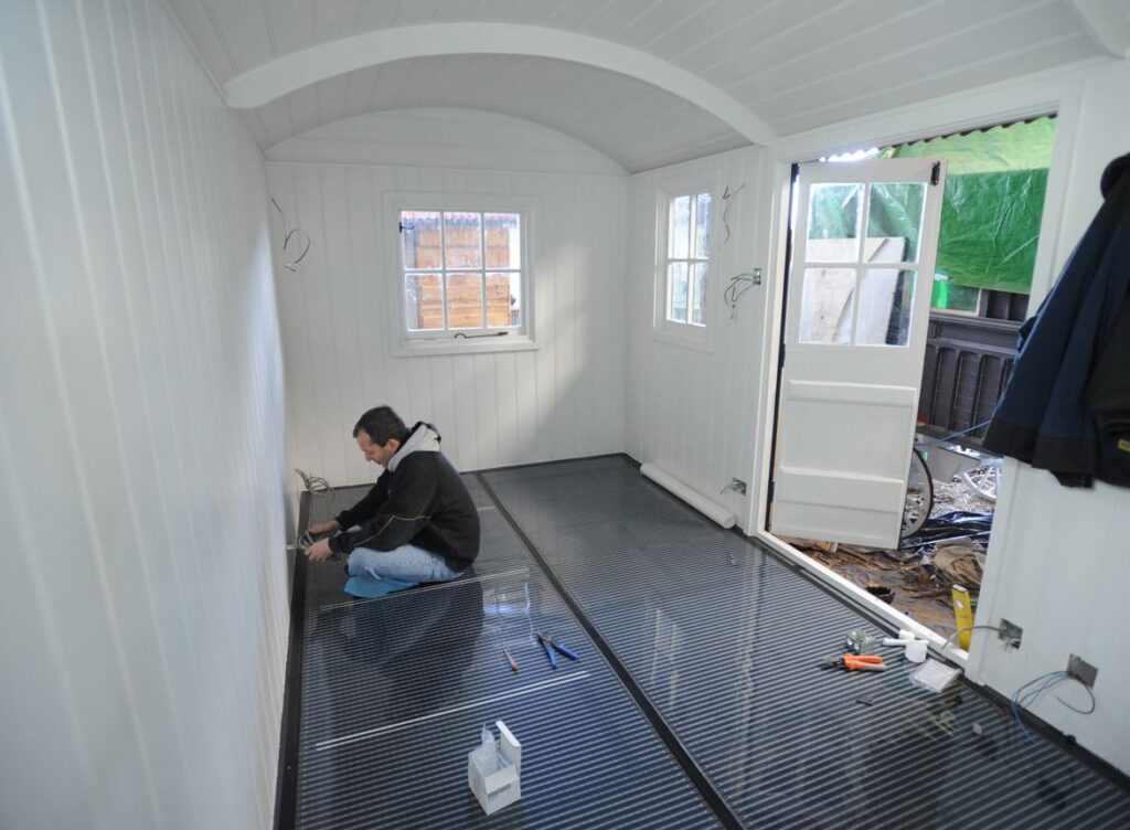 underfloor heating into small garden room