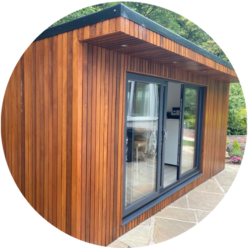 garden rooms worsley dark cladding with overhang